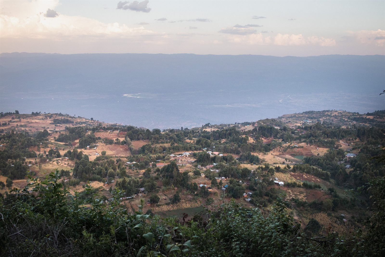 The Kerio Valley at dusk, farms and villages below the escarpment